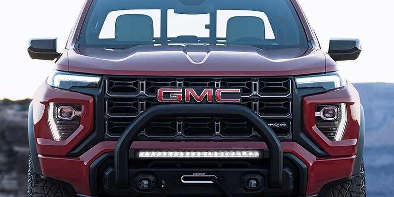 Front view of the 2026 GMC Canyon highlighting bold GMC grille and off-road styling in Opelika, AL