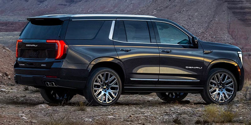 A black Yukon parked on ground
