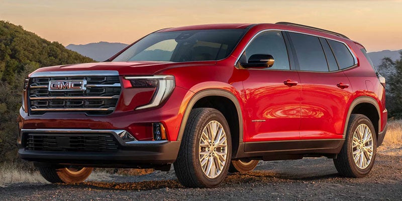 Standing Out Front of Glynn Smith GMC Dealership